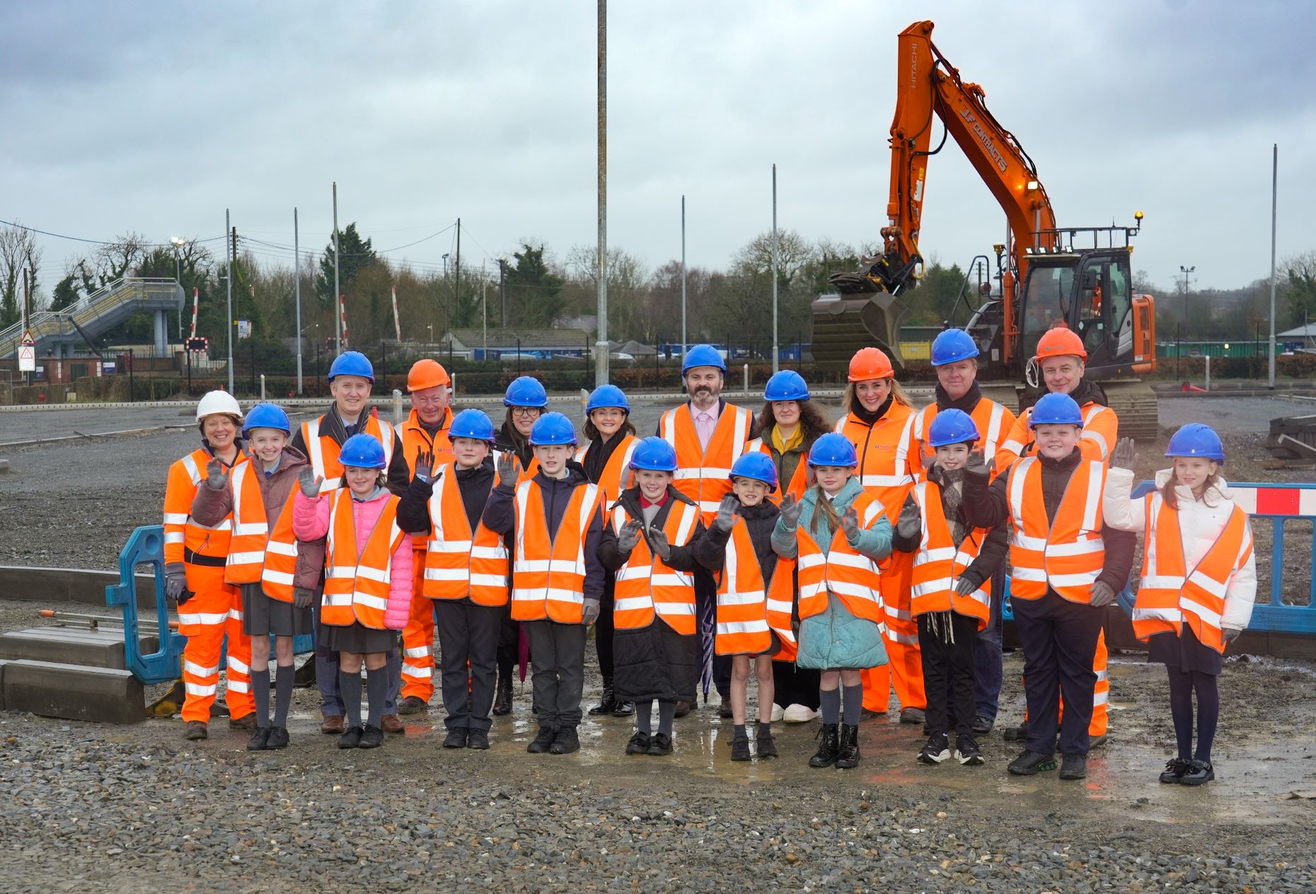 A photo of school children from Moira at the construction site of the Moira Park and Ride