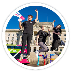 Young people pictured at front of Stormont for Youth Summit event